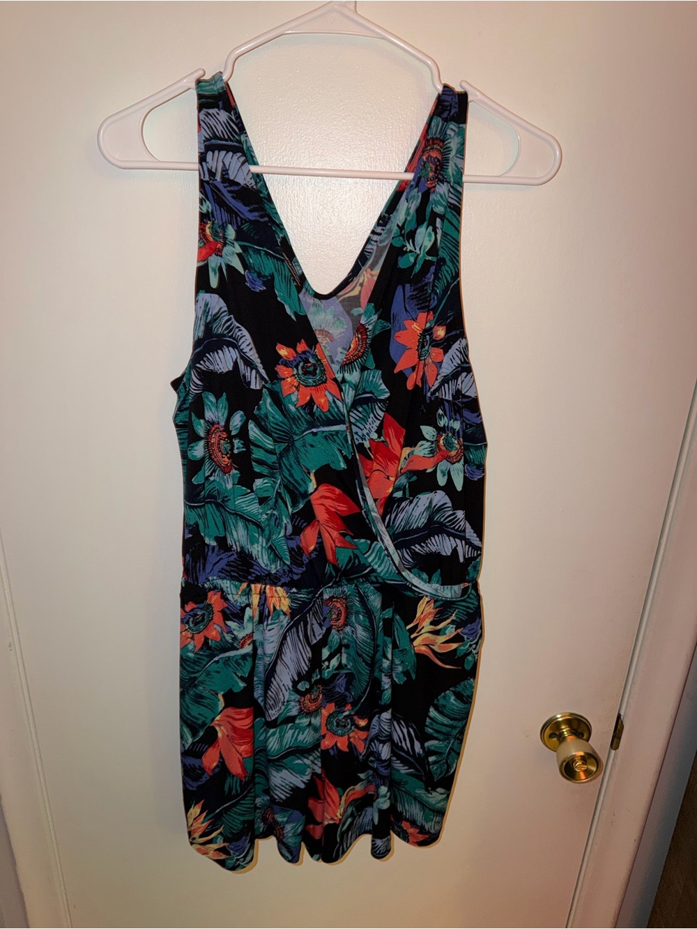 Simply Styled Black Tropical Floral Romper with Teal and Coral Accents